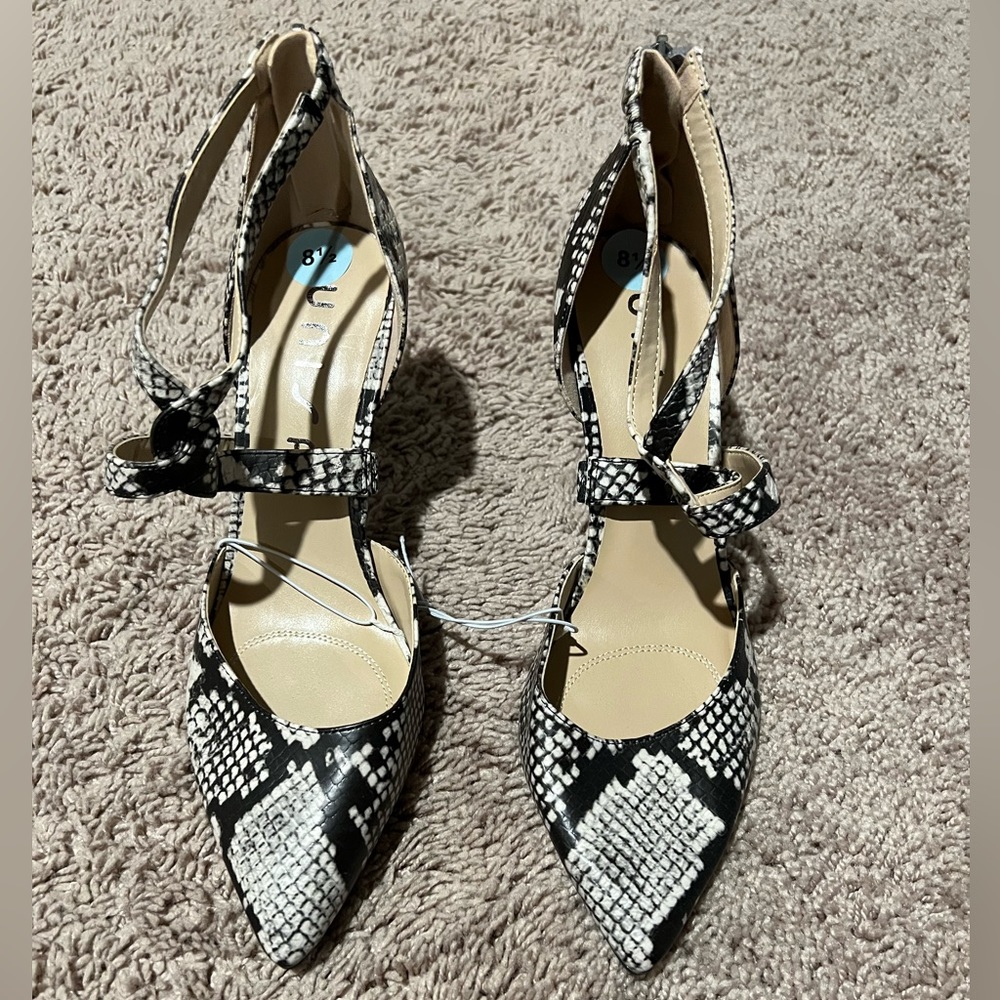 Unisa snake print heels, size 8.5, never worn and new with tags.